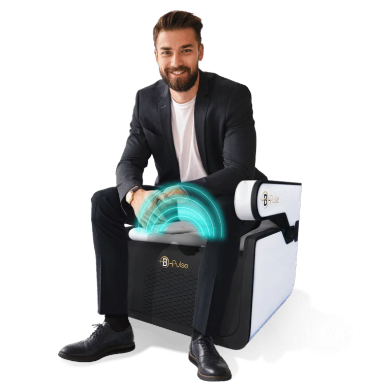 Man seated on B-Pulse electromagnetic pelvic floor therapy chair at Thrive! MedAesthetics