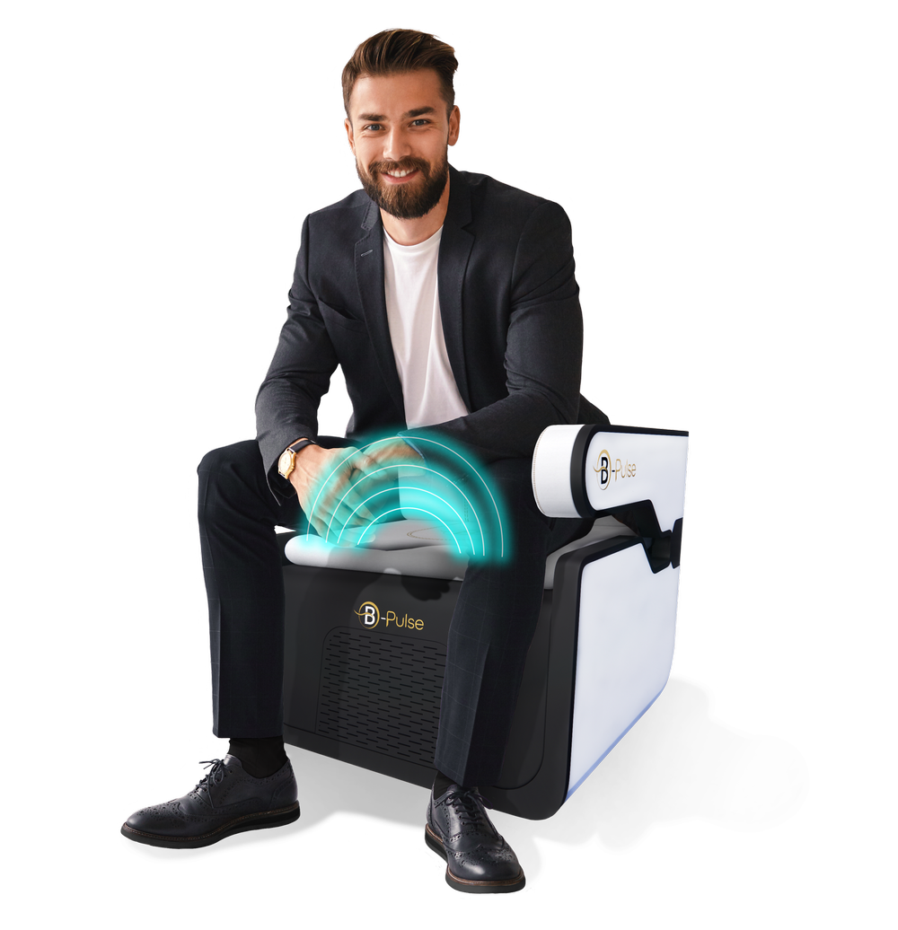 Man seated on the B-Pulse electromagnetic pelvic floor therapy chair at Thrive! MedAesthetics