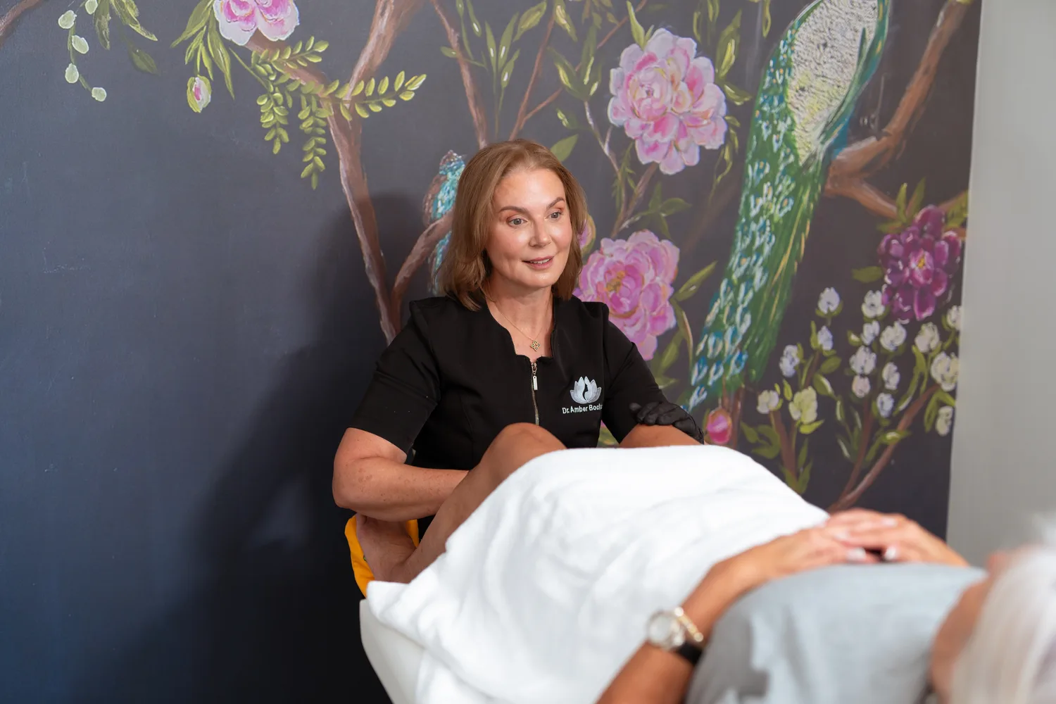 Dr. Amber Bocknek performing an intimate wellness procedure at Thrive! MedAesthetics